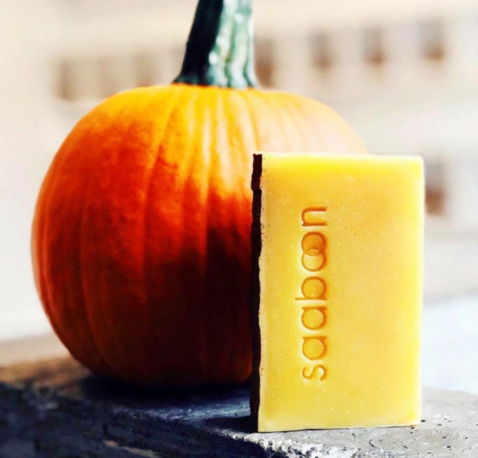 Pumpkin Spice Soap with a Pumpkin in the background
